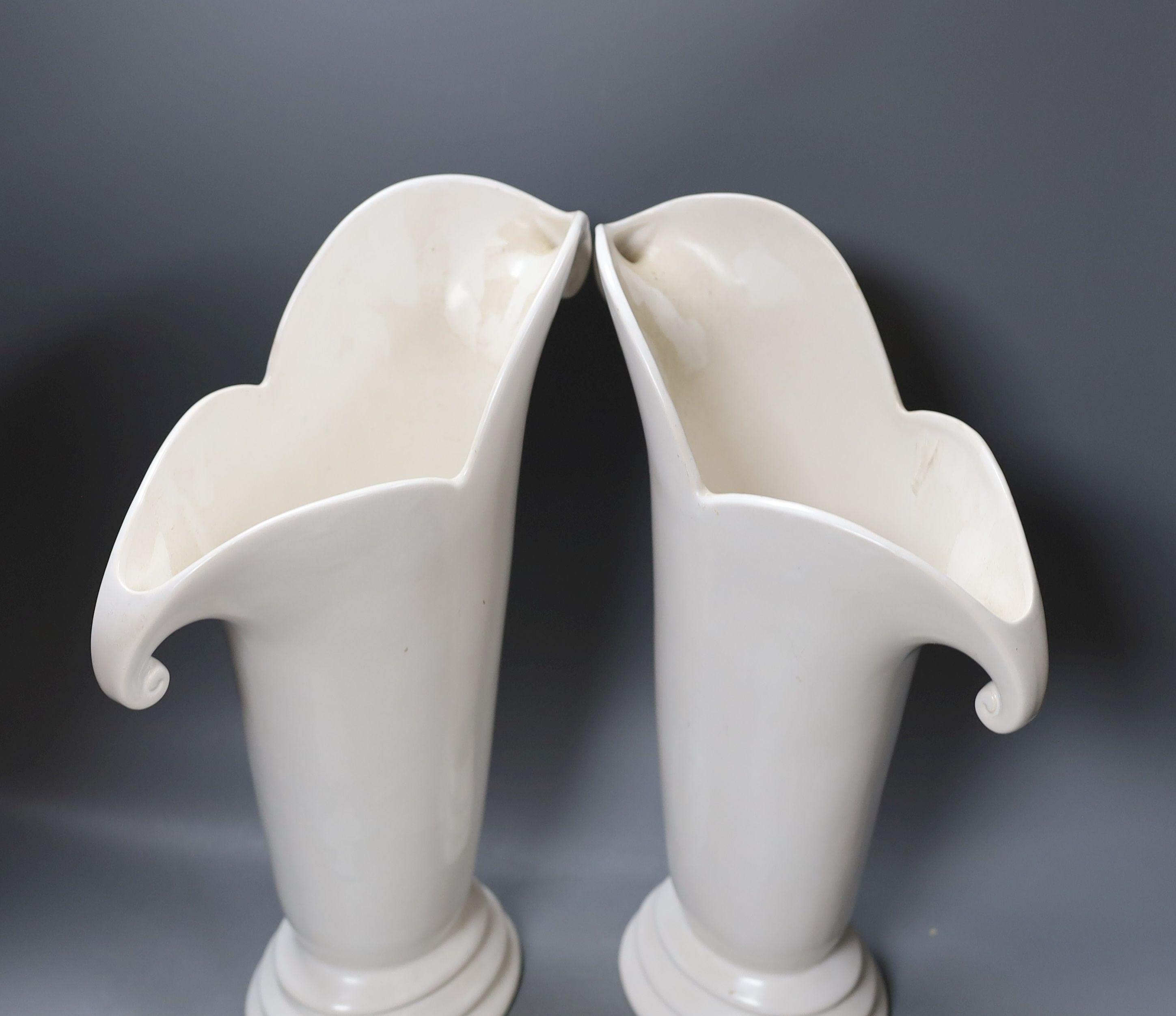 A large pair of Art Deco pottery vases, 41cm